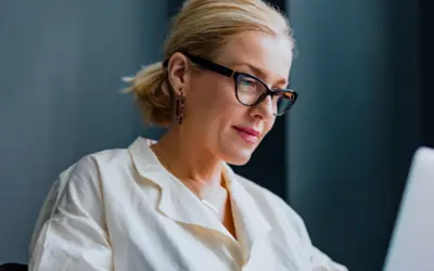 Business woman working on laptop